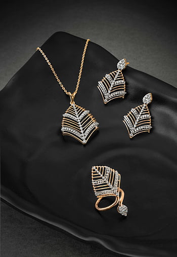 luxurious jewelry set, black surface, elegant diamond necklace, earrings, ring set, stylish black plate, diamond jewelry, gold jewelry, high-end jewelry, luxury accessories, elegant jewelry display