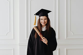 graduate, cap and gown, diploma, achievement, happy graduate, graduation, toga, academic success, educational milestone, graduation ceremony, smiling graduate