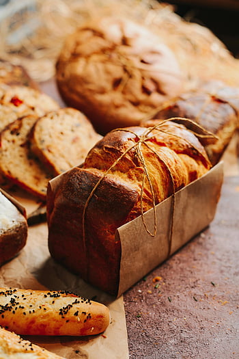 pâtisseries fraîches, Pains artisanaux, baguette, boulangerie rustique, éclairage naturel, boulangerie, présentoir à pain, pain artisanal, produits de boulangerie, Photographie au pain, pain de campagne