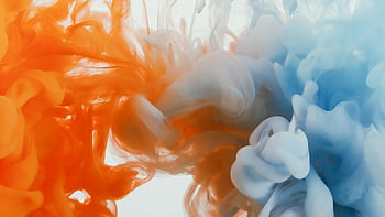 liquid reaction, mixing paints, orange paint, blue paint, abstract flow, vibrant scene, dynamic colors, color mixing, paint interaction, artistic composition, fluid art