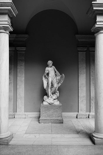 marble statue, classic sculpture, Washington DC museum, elegantly displayed, columns, art gallery, indoor exhibit, historical art, stone figure, cultural artifact, archway display
