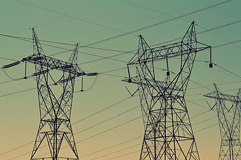 high voltage power lines, twilight sky, energy infrastructure, silhouette, metal wire rack, power transmission, electrical grid, utility poles, power distribution, infrastructure photography, energy systems