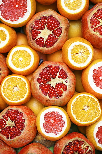citrusové plody, granátová jablka, plátky pomeranče, grapefruity, čerstvé ovoce, Barevný mix, Detailní fotka, zářivé barvy, zdravé jídlo, ovocné řezy, ovocný sortiment