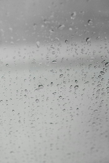 raindrops, wet window, gloomy day, gray sky, overcast sky, moody ambiance, rain on window, rainy day, water droplets, window glass, outdoor weather
