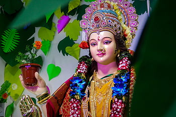Durga idol, vibrant Durga, festival decoration, Hindu traditions, Mumbai festival, close-up statue, cultural traditions, adorned statue, festival idol, colorful statue, religious statue