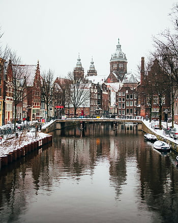 Amsterdam canal, Basilica of Saint Nicholas, winter view, snowy canal, scenic view, Amsterdam architecture, Dutch canal, historic buildings, winter landscape, Netherlands, Amsterdam winter