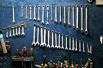 tool wrench, workshop wall, neatly arranged, mechanics tools, wrench set, workshop tools, tool organization, metal wrenches, garage tools, tool storage, mechanic tools