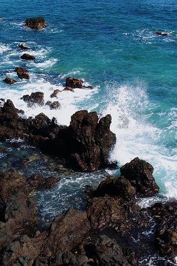 sea waves, breaking waves, rocky coastline, Puerto de la Cruz, Spain, ocean waves, coastal rocks, crashing waves, coastal scenery, natural landscape, turquoise water