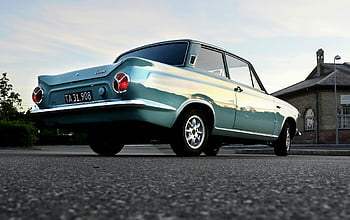 vintage sininen auto, ford auto, pysäköity, kaupungin katu, auringonlasku, matala kulma, bungalowitalo, vintage-ajoneuvo, klassinen auto, kaupunkiympäristössä, katuvalokuvaus