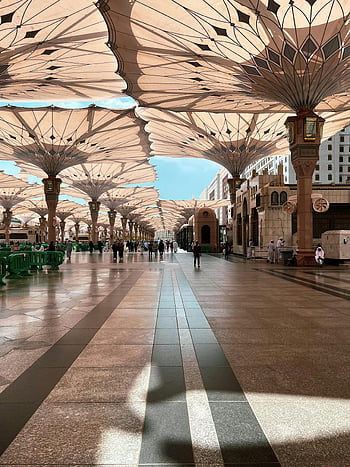 people walking, hallway, elegant architecture, umbrellas, mosque, Saudi Arabia, modern style, cultural heritage, architectural design, cultural site, religious site