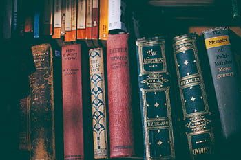 vintage books, classic literature, wooden shelf, book collection, The Last Bow, close-up, antique books, literary classics, bookshelf, old books, book spines