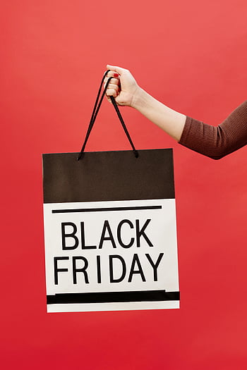Black Friday, shopping bag, vibrant red background, hand holding, Black and White, tote bag, Black Friday shopping, red background, shopping tote, Black Friday deals, shopping season