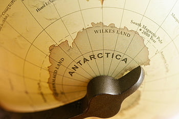 Antarctica, globe, vintage globe, close-up, detailed labels, Wilkes Land, South Magnetic Pole, geographic labels, Antarctica map, globe close-up, vintage map