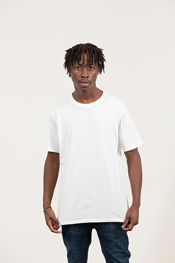 serious young black man, studio portrait, casual white T-shirt, jeans, white background, young man, black guy, looking at camera, studio shot, casual outfit, white backdrop