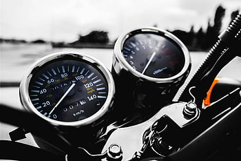 motorcycle speedometer, tachometer, precision engineering, detailed shot, motorcycle dashboard, speedometer gauge, tachometer gauge, motorcycle controls, motorcycle instrumentation, motorcycle gauges, motorcycle display