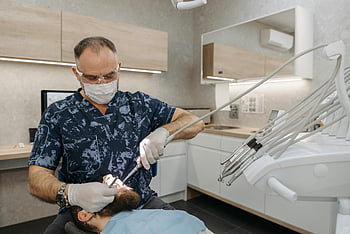 dentist, dental examination, patient's teeth, modern clinic, routine dental check, dental clinic, dental tools, dental hygiene, dental care, dental professional, patient care