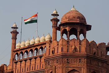 Red Fort, New Delhi, Mughal architecture, Indian flag, iconic landmark, historical site, Delhi fortress, cultural heritage, travel destination, India tourism, architectural marvel