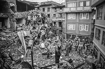 earthquake aftermath, Bhaktapur Nepal, rescue operations, soldiers sifting rubble, grayscale image, disaster relief, building destruction, natural disaster, emergency response, urban destruction, rescue workers
