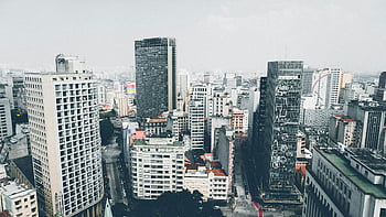 aerial photography, city buildings, urban cityscape, modern architecture, clear sky, vibrant city, diverse architecture, city skyline, urban landscape, high-rise buildings, city view