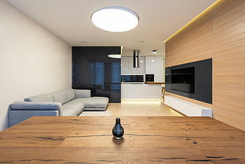nowoczesne mieszkanie, stylowy design, Wygodne meble, Przestronny salon, otwarta kuchnia, Elegancki design, Współczesne wnętrze, drewniany stół, minimalistyczny wystrój, nowoczesny apartament, przestrzeń życiowa