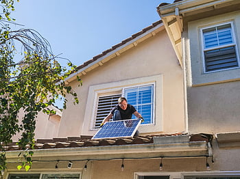 solar technician, photovoltaic panels, rooftop installation, sunny day, solar energy, renewable energy, home solar panels, solar panel installation, solar power, residential solar, sustainable energy