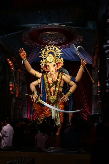 umbai Cha Raja 2023, Lord Ganesha, Ganesh Chaturthi festival, Mumbai, India, majestic statue, religious celebration, cultural event, traditional festival, spiritual gathering, decorative backdrop