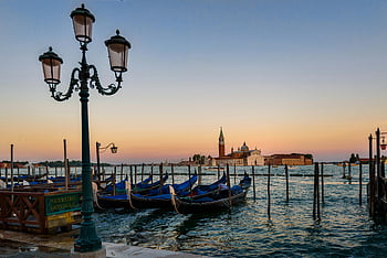 Venetian sunset, gondolas, San Giorgio Maggiore, tranquil scene, twilight, ocean view, boats, green metal post, Venice, Italy, waterfront
