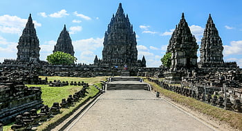 Prambanan Temples, Indonesia, UNESCO World Heritage Site, stunning view, ancient architecture, temple complex, cultural landmark, historical site, travel destination, Southeast Asia, religious monument