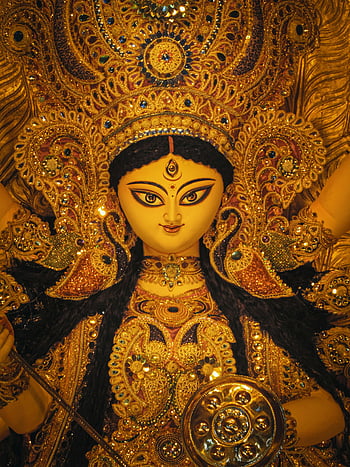 Durga Puja, Goddess Durga, Kolkata, India, Durga Puja festival, intricate idol, colorful idol, Durga Puja Art, golden idol, traditional art, religious festival