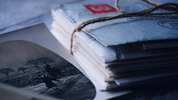 vintage letters, envelopes, twine, black and white photograph, close-up, old letters, pile of letters, vintage envelopes, old photograph, nostalgic, antique mail