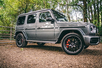 mercedes-benz g-class, SUV di lusso, parcheggiata, strada sterrata, area boschiva, eleganza, energia, panoramico, all'aperto, veicolo, Mercedes-Benz