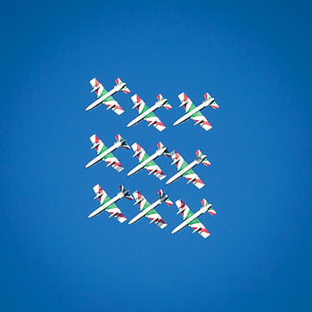 Green-and-white Show Planes, sky, fighter jets, precise formation, vibrant blue sky, airshow, jet formation, aviation display, aerial performance, military aircraft, airshow planes