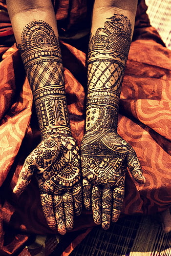henna tattoos, Indian bride, cultural traditions, detailed henna art, hands decorated, arms covered, henna designs, traditional henna, henna patterns, Indian wedding, henna ceremony