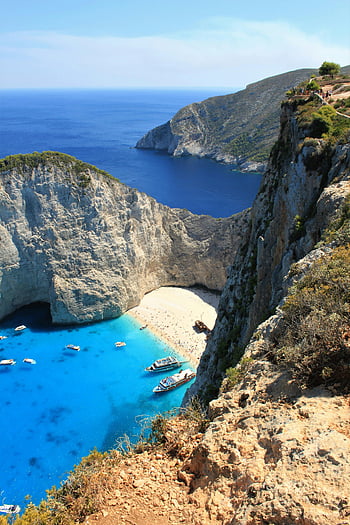 navagio beach, zakynthos, Řecko, Čisté tyrkysové vody, Dramatické útesy, letecký pohled, modré vodní útvar, hnědý skalní útvar, nádherný výhled, pláž ztroskotání, Středozemní moře