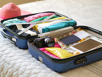 suitcase, clothes, camera, passport, summer vacation, open suitcase, assorted items, travel preparation, packing, vacation essentials, luggage contents