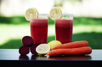 carrot fruit, lemon fruit, black wooden table, beetroot juice, carrot juice, lemon slices, health, freshness, colorful glasses, garnished, juice