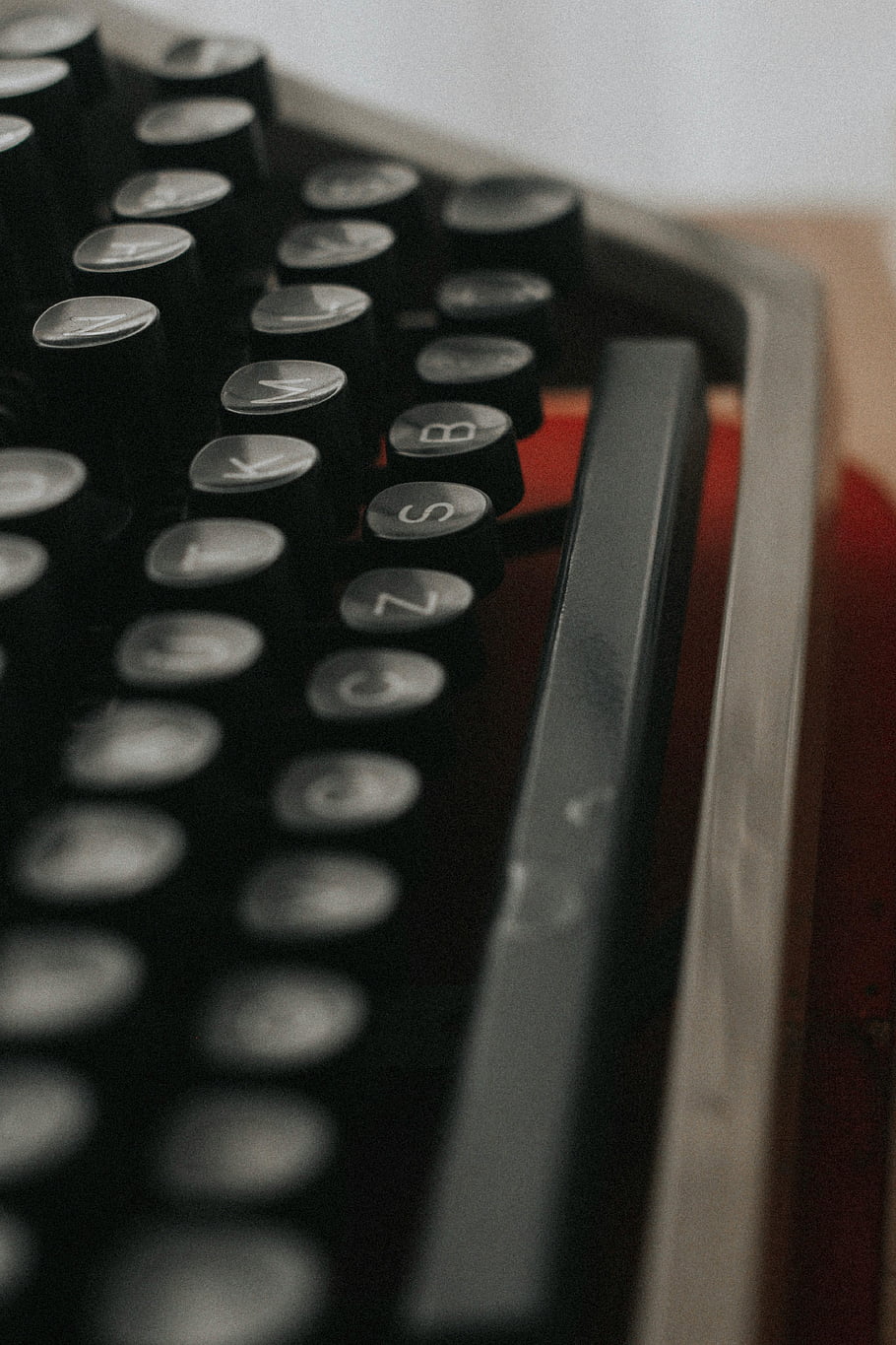 vintage typewriter, typewriter keys, old fashioned typewriter, classic typewriter, nostalgic setting, close-up typewriter, retro typewriter, vintage writing machine, typewriter letters, typewriter close-up, vintage keyboard