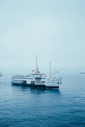 white ferry, sailing, calm waters, cloudy sky, serene image, sea, boat, maritime, transportation, ocean, vessel