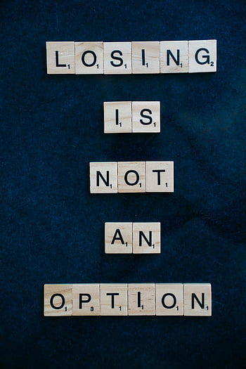 wooden Scrabble tiles, blue surface, inspiring message, losing is not an option, dark surface, motivational quote, Scrabble letters, wooden letters, blue background, game pieces, word puzzle