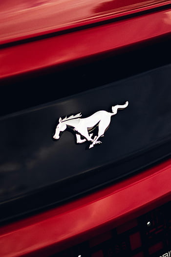Ford Mustang, Mustang emblem, silver emblem, red Ford vehicle, detailed view, car emblem, Ford logo, Mustang logo, automotive emblem, car detail, Ford Mustang logo