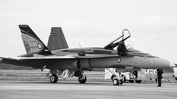 fighter jet, Canadian fighter jet, airstrip, monochrome image, aviation, military theme, grayscale photo, Canadian military, aircraft, jet, military aircraft