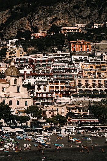 Positano, Amalfi Coast, beach town, cliffside buildings, vibrant buildings, stunning view, coastal town, Italian coast, seaside town, Positano beach, Mediterranean coast
