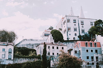 Sintra National Palace, historic architecture, lush greenery, Portugal buildings, picturesque view, Sintra, national palace, historic buildings, green landscape, European architecture, travel destination