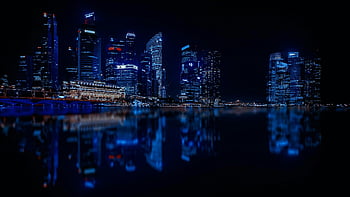 조명 된 CityScape, 파란 하늘, 야경, 도시의 스카이 라인, 조명 초고층 빌딩, 침착 한 물, 반사, 도시의 야간 장면, 현대 건축, 워터 프론트 시티, 밤 사진
