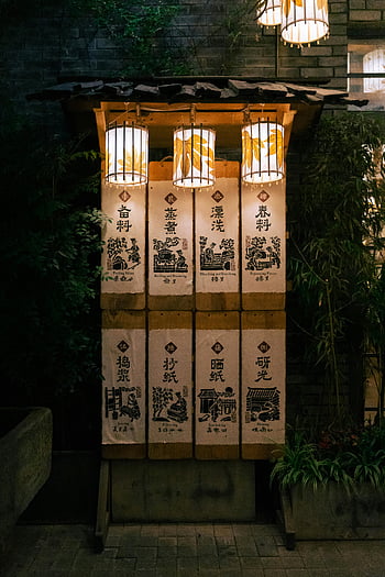 Traditional Chinese Lanterns, illuminated lanterns, artistic drawings, outdoor night scene, Chinese culture, decorative lanterns, night photography, traditional art, cultural heritage, outdoor lighting, lantern festival