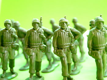 marching soldiers, plastic figurines, green plastic toys, toy soldiers, strategic play, vibrant background, miniature figures, military toys, collectible toys, playset, action figures