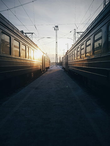 train, golden hour, sunrise, railway symmetry, empty station, two trains, railway tracks, train station, morning light, train photography, railway scene