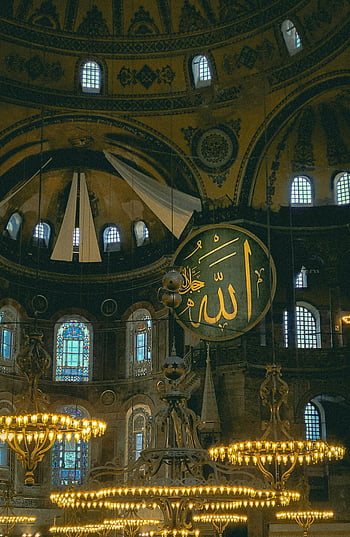 Hagia Sophia, Istanbul, Turkey, interior, ornate, Islamic art, vibrant lighting, chandeliers, stained glass, dome, atmosphere