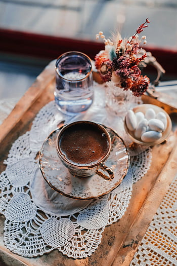Turkish coffee, dried flowers, sweets, decorative tray, glass of water, charming arrangement, lace doily, vintage tray, coffee cup, floral arrangement, Turkish sweets