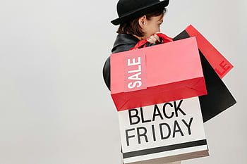 Black Friday, shopping bags, stylish woman, sale, neutral background, fashion, retail, consumerism, holiday shopping, deals, discounts